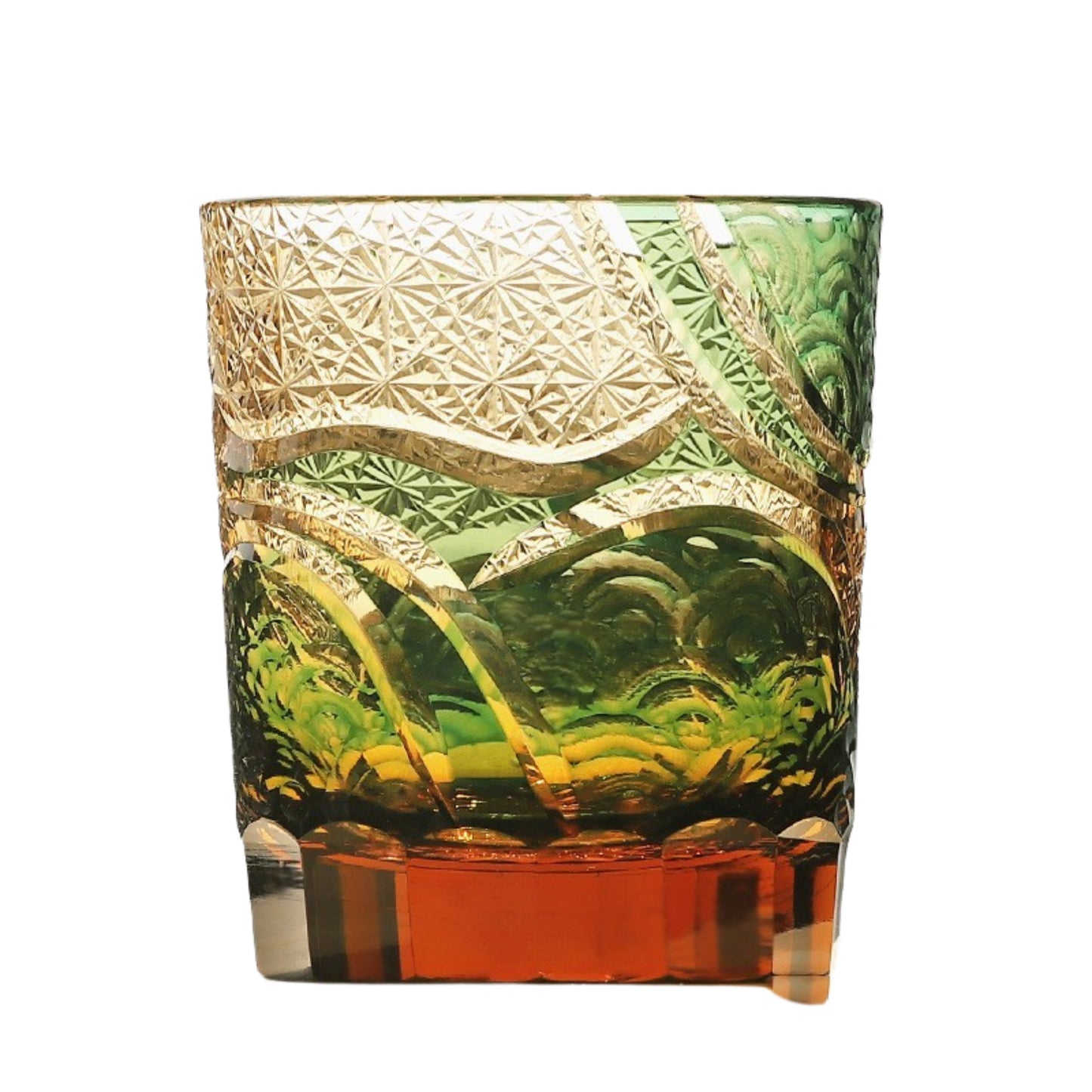 Green Japanese Edo Kiriko glass with diamond-cut pattern and amber base
