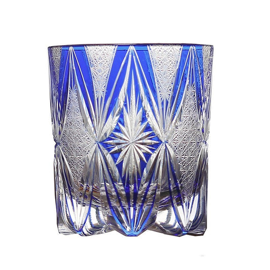 Blue Edo Kiriko whiskey glass with radiant starburst and diamond-cut engraving
