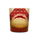 Red Edo Kiriko whiskey glass with traditional diamond-cut motifs and amber gradient.

