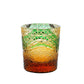 Green Edo Kiriko whiskey glass with fine engraved patterns and warm amber base.

