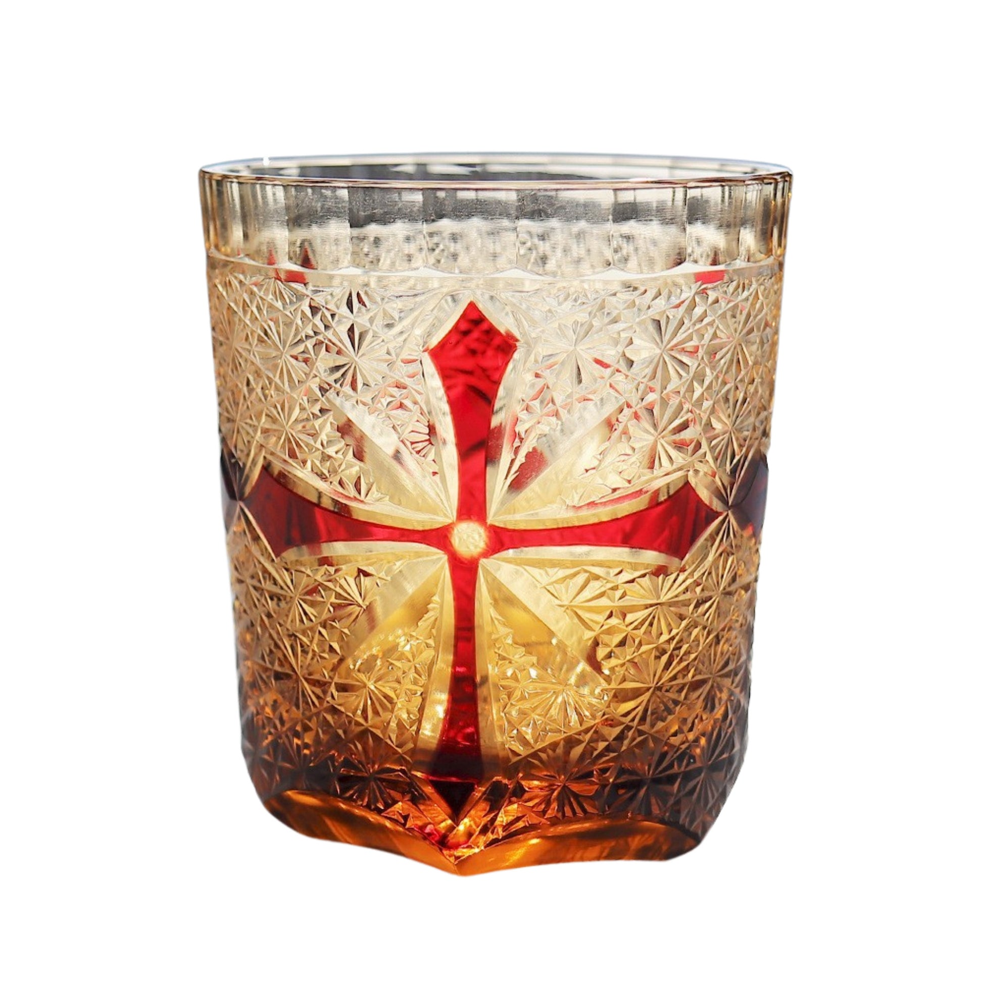Edo Kiriko whiskey glass – rich red cross pattern blending into amber crystal with traditional cut details.

