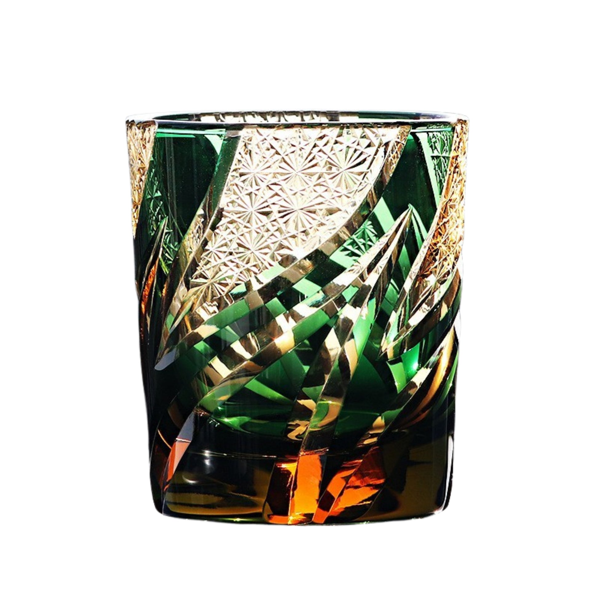 Homura Edo Kiriko whiskey glass – emerald green base with golden motif and crystal detailing.

