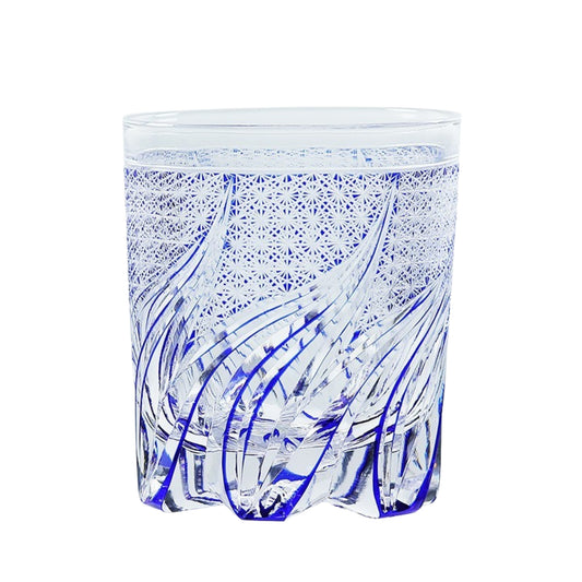 Transparent Edo Kiriko whiskey glass with blue wind-inspired engravings and detailed hand-cut pattern
