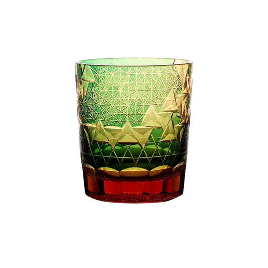 Green Japanese Edo Kiriko glass with diamond-cut pattern and amber base
